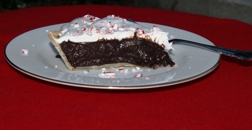 Dark Chocolate Candy Cane Pie: Dark Chocolate Pie with a Holiday Twist. Perfect for a holiday potluck or as a holiday sweet treat. 