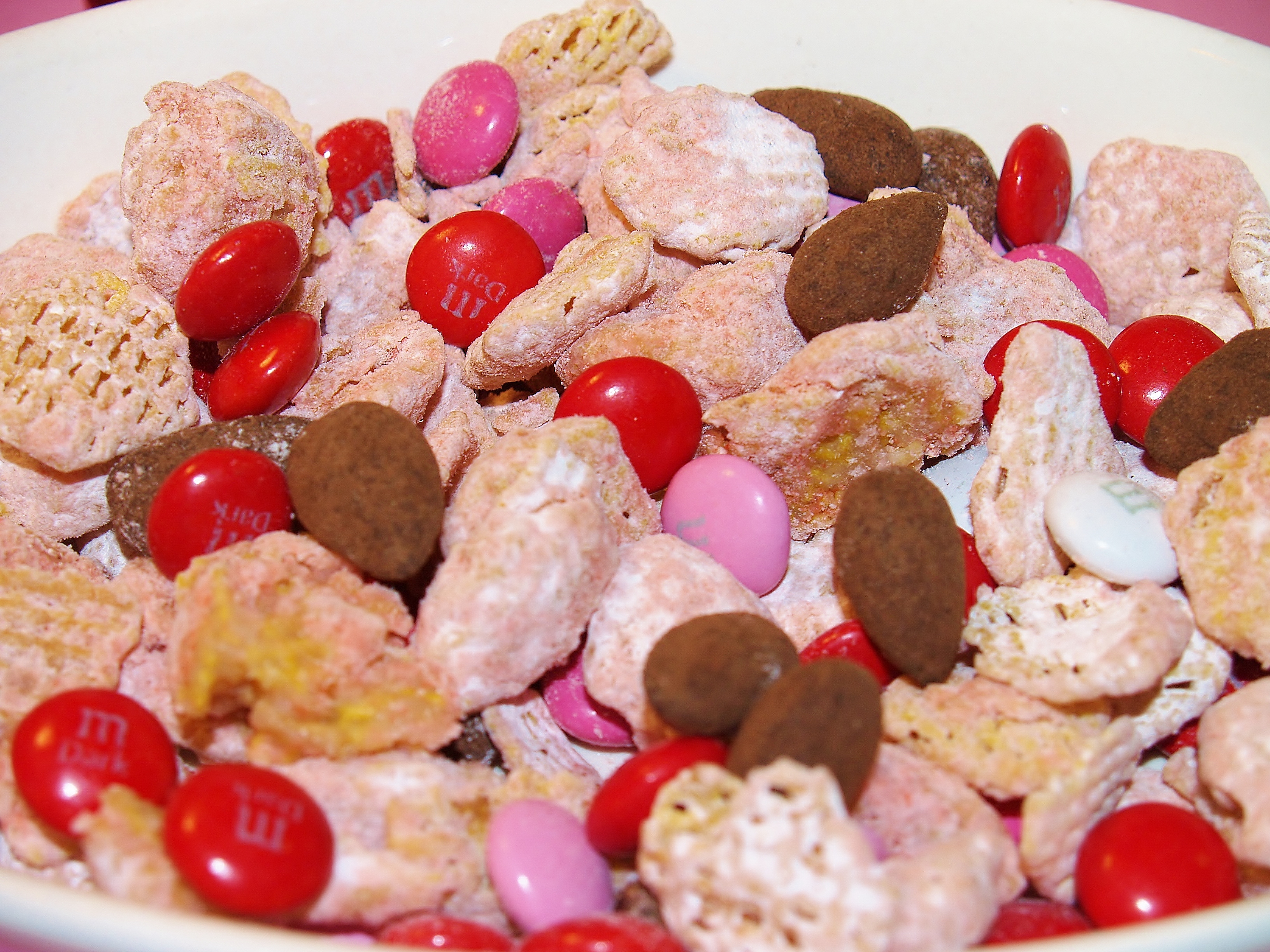 Strawberry Cheesecake Puppy Chow with Dark Chocolate Accent